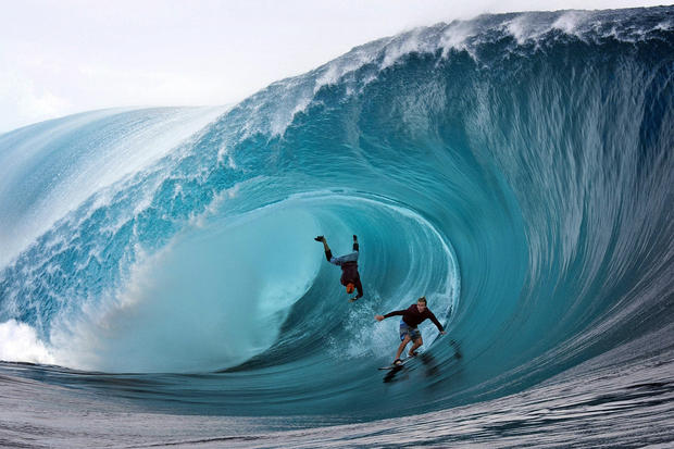surfing at tahiti